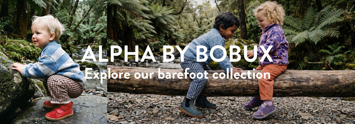 children playing in a forest all wearing bobux barefoot style shoes
