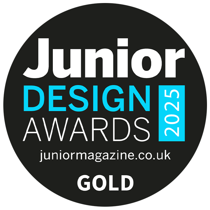 A circular black badge with white and bright blue text reading 'Junior Design Awards 2025' and 'GOLD'.