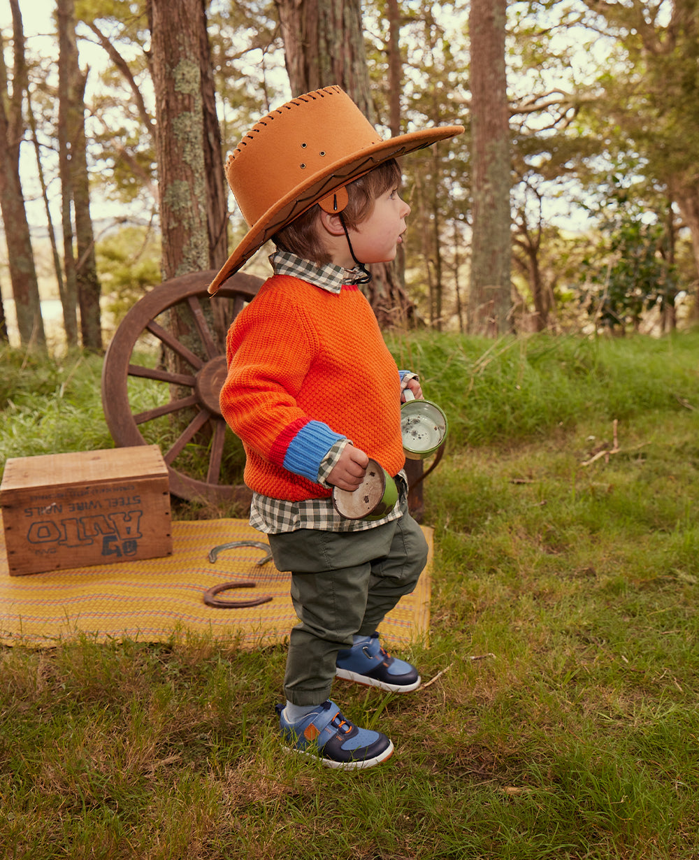 New Frontier - image of boy wearing Bobux shoes