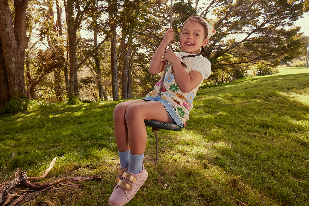 The Tranquil Troupe - image of girl wearing Bobux Grass Court shoes in Ballet Pink